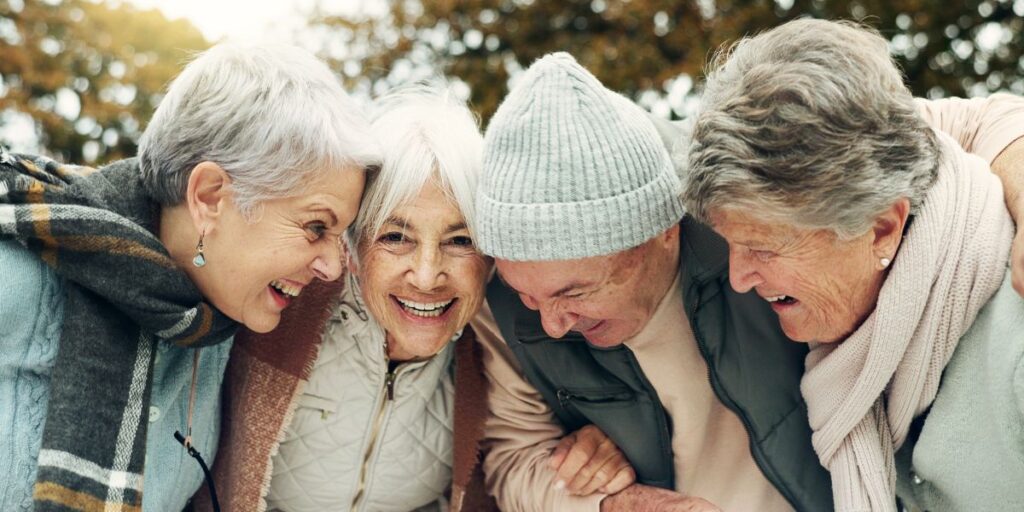 A group of happy senior friends spending time together at the Thousand Oaks Assisted Living community