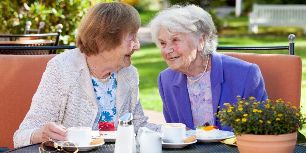 Senior friends enjoying tea at the short term respite care in Thousand Oaks